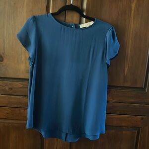 Loft blouse. Aqua blue. Small. Great condition. Buttons up back. Tulip sleeves